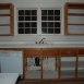 Kitchen has custom open cabinets