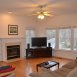 Great sized family room with wood floors & a ceiling fan!