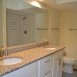 This is the first floor master bedrooms private bath-2 sinks, tile shower....