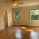 2nd floor master bedroom is also a good size & has wood floors, ceiling fan, WIC & luxury bath.