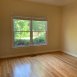 First floor bedroom has WIC, ceiling fan & adjacent full bath.