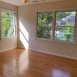 Another bedroom on the 2nd floor-this one has more windows plus the ceiling fan and wood floors.