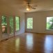 First floor bedroom is BIG & has a ceiling fan & wood floors.