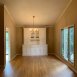 Formal dining room has great windows and a built in cabinet for storage.