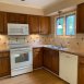 Kitchen has great cabinet & counter space.