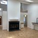 Spacious family room with volume ceilings.