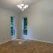 Formal dining room has great wall space.
