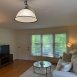  Awesome size family room w/wall of windows overlooking woods to the rear.
