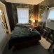 Bedroom with two windows